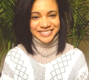 A picture of Sara Reed smiling.