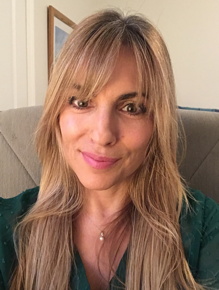 A picture of Susan smiling.